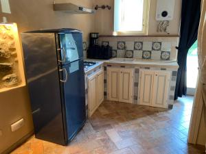 Kuchyň nebo kuchyňský kout v ubytování Agriturismo Pratofranco