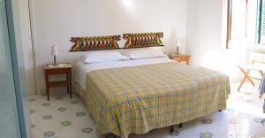 Posteľ alebo postele v izbe v ubytovaní Villa Casale Ravello Residence
