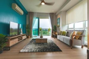 Oleskelutila majoituspaikassa Santubong Suites B Just Like Home Damai