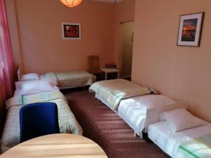 Postel nebo postele na pokoji v ubytování Minhauzena Unda