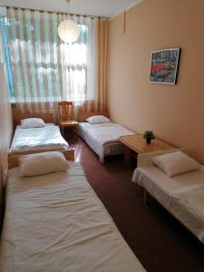 Postel nebo postele na pokoji v ubytování Minhauzena Unda