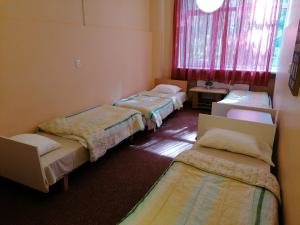 Postel nebo postele na pokoji v ubytování Minhauzena Unda