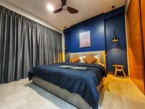 Lova arba lovos apgyvendinimo įstaigoje Santubong Suites B Just Like Home Damai