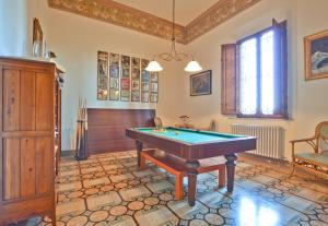a living room with a pool table in it at Villa Bellavista - Tuscany panoramic view in Crespina +22 photos