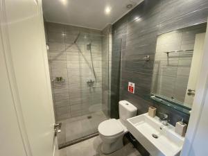 Koupelna v ubytování VIAL Rooms
