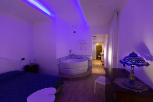 Postel nebo postele na pokoji v ubytování Hotel Vietri Coast