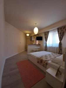 Postel nebo postele na pokoji v ubytování Casa Flamingo