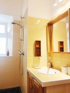 a bathroom with a sink and a shower at Calma Aljezur in Aljezur +14 photos