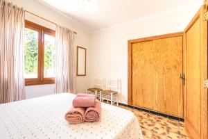 Ένα ή περισσότερα κρεβάτια σε δωμάτιο στο Villa Es Pinar +23 φωτογραφίες