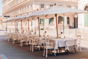 Reštaurácia alebo iné gastronomické zariadenie v ubytovaní Bettoja Hotel Massimo d'Azeglio