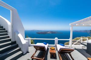 a balcony with a view of the ocean at Iatis View Collection in Imerovigli