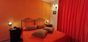 Postel nebo postele na pokoji v ubytování Hotel Neapolis