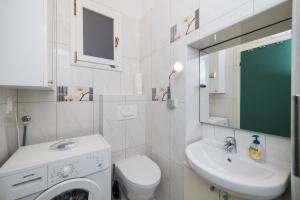 Koupelna v ubytování Apartment Riva