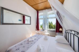 Postel nebo postele na pokoji v ubytování Apartment Riva