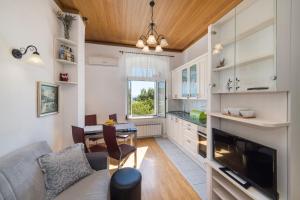 Kuchyň nebo kuchyňský kout v ubytování Apartment Riva