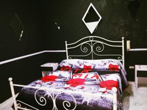 Łóżko lub łóżka w pokoju w obiekcie Hotel Napoleon-Cuore
