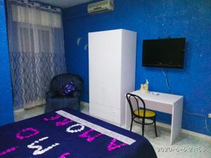Telewizja i/lub zestaw kina domowego w obiekcie Hotel Napoleon-Cuore