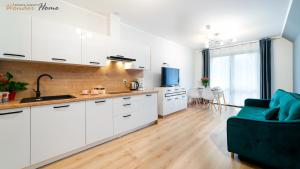 Nhà bếp/bếp nhỏ tại Wonder Home - Apartamenty blisko wyciągów Ski Arena, parku wodnego, restauracji, Kościółka Wang