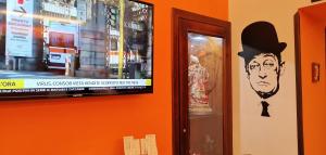 TV a/nebo společenská místnost v ubytování Hotel Neapolis