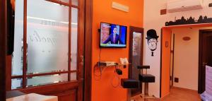 TV a/nebo společenská místnost v ubytování Hotel Neapolis