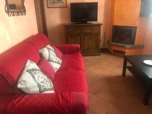 TV a/nebo společenská místnost v ubytování Casa Rosa