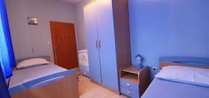 Postel nebo postele na pokoji v ubytování Apartmani Barbara App2