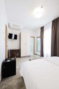 Hotel Lucija客房内的一张或多张床位