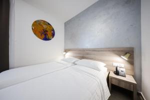 Hotel Lucija客房内的一张或多张床位
