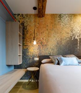 Postel nebo postele na pokoji v ubytování Apartamentos Pensua Sisargas