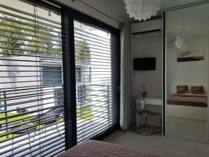 Posteľ alebo postele v izbe v ubytovaní Aprum Apartments 12C