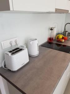 Kuchyňa alebo kuchynka v ubytovaní Aprum Apartments 12C