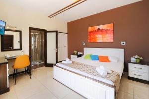 Postel nebo postele na pokoji v ubytování Mariblu Hotel