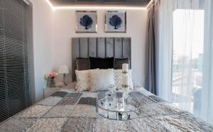 En eller flere senge i et værelse på ORKAN rooms&restaurant