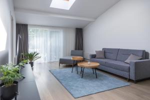 Posezení v ubytování Apartment Hotel Laisve