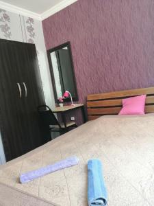 Postel nebo postele na pokoji v ubytování Guest House Monshishi