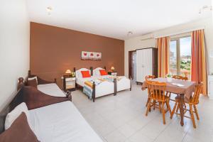 Postel nebo postele na pokoji v ubytování Mariblu Hotel