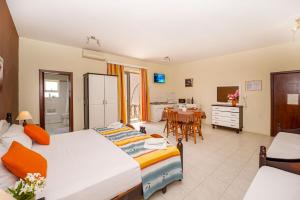 Postel nebo postele na pokoji v ubytování Mariblu Hotel