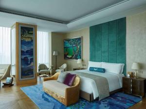 Letto o letti in una camera di Raffles Jakarta