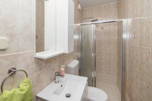 Kúpeľňa v ubytovaní Apartmani Kala + 23 fotografií