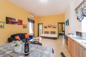 TV a/nebo společenská místnost v ubytování Mariblu Hotel