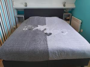 Krevet ili kreveti u jedinici u okviru objekta Appartement De Panne Zonneblik
