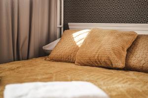 Posteľ alebo postele v izbe v ubytovaní ZAKOHOME- Apartamenty Kościelisko Centrum