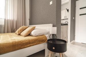 Posteľ alebo postele v izbe v ubytovaní ZAKOHOME- Apartamenty Kościelisko Centrum