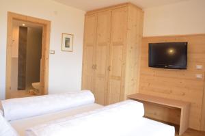 Postel nebo postele na pokoji v ubytování Hotel Karin