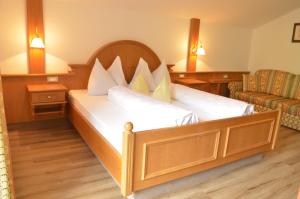 Postel nebo postele na pokoji v ubytování Hotel Karin