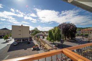 a view from a balcony of a city street at De Kei Luxe apartment Valkenburg in Valkenburg