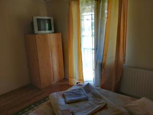 Postel nebo postele na pokoji v ubytování Sóhegy Panzió