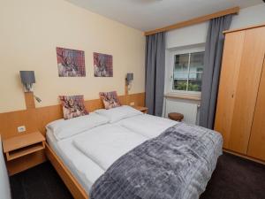 Posteľ alebo postele v izbe v ubytovaní Haus Veronika - Appartements by Miha