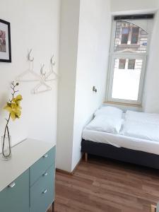 Кровать или кровати в номере Sobieski Town Apartments