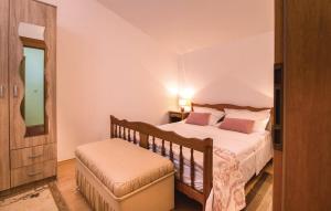 Postel nebo postele na pokoji v ubytování Holiday Home Parada + 29 fotografií